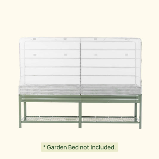 Mesh Cover System for Elevated Garden Beds installed on a green elevated garden bed on a white background.