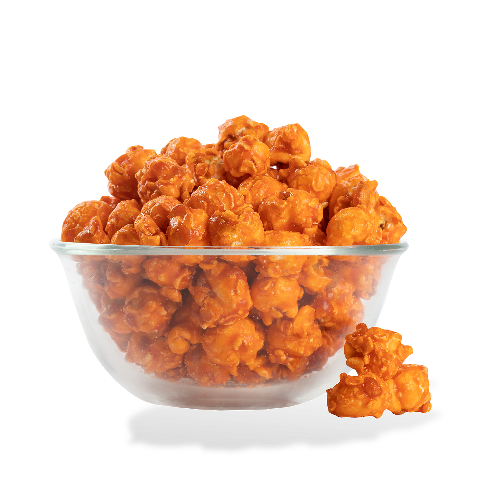 Orange Popcorn popped in a bowl on a white background