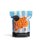 Bag of City Pop Orange popcorn with blue and white striped design on a white background