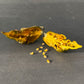 Gator Jigsaw Pepper Mature pepper shown to represent seeds for sale, cut open to display seeds inside on gray table
