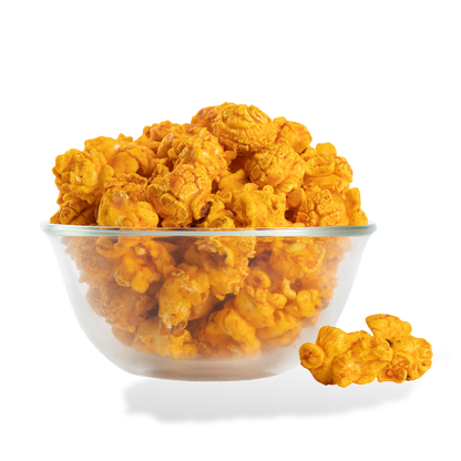 Pizza Popcorn popped in a bowl on a white background