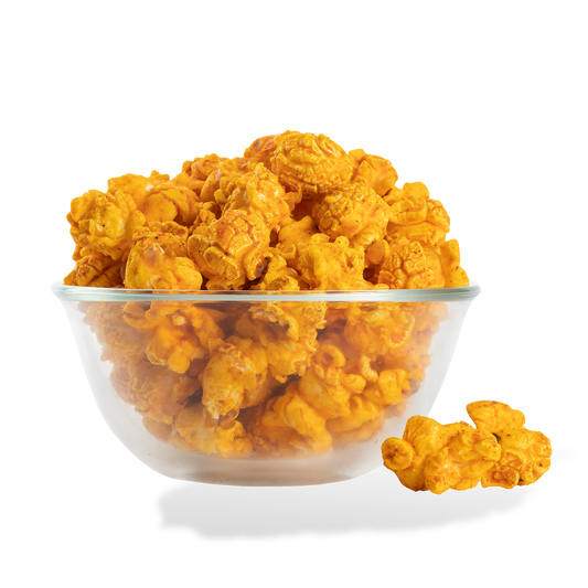 Pizza Popcorn popped in a bowl on a white background