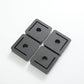 Four gray platform feet on a white background