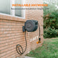 Retractable garden hose reel with leader hose installed against a brick wall, indicating installable anywhere with a recommended height of 2.6 feet from the ground.