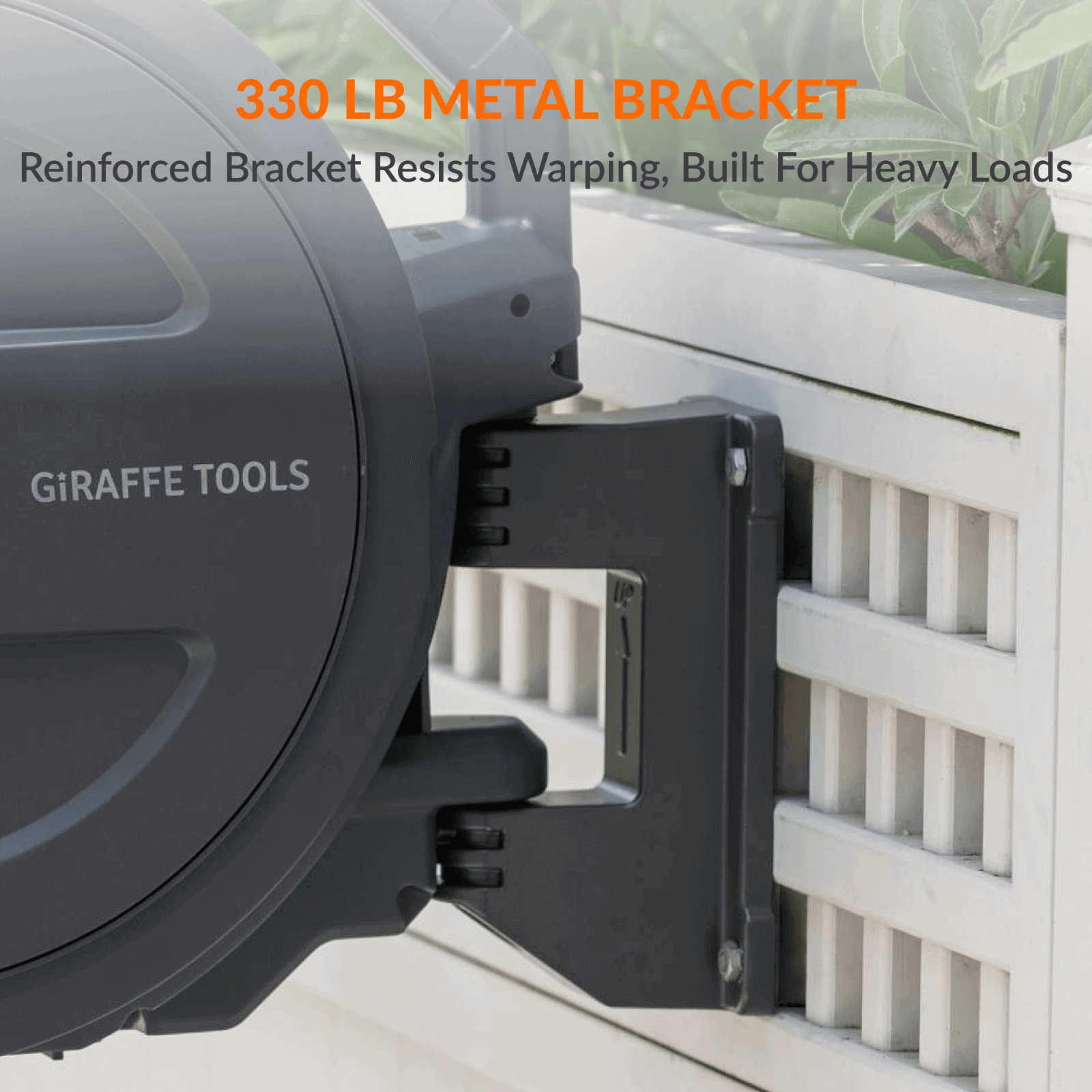 The retractable garden hose reel attached to an exterior wall with text of 330 pound metal bracket is reinforced, resists warping, and built for heavy loads to showcase the metal bracket option.