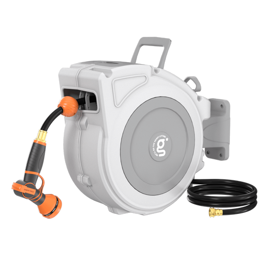 Retractable garden hose reel with hose and nozzle on a white background