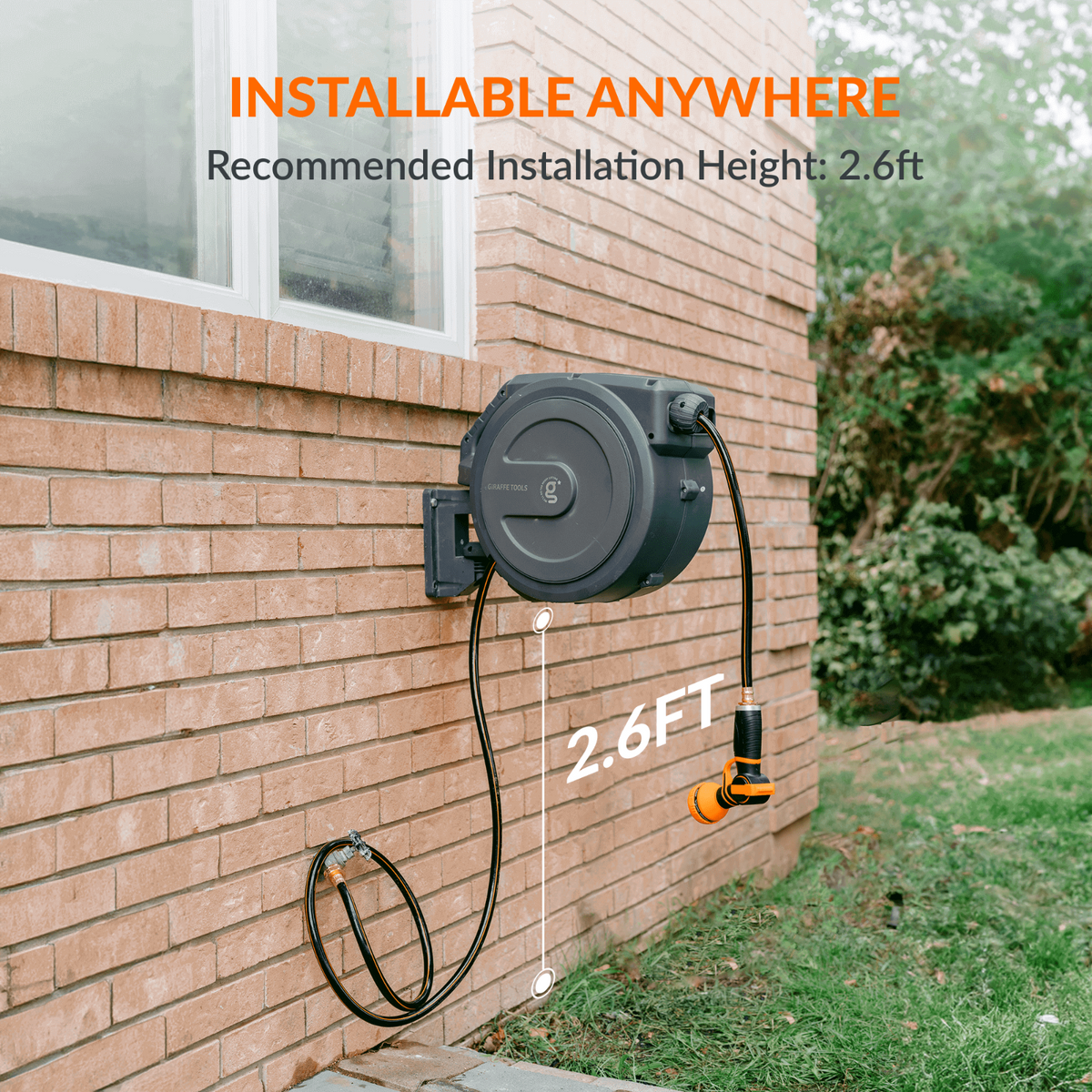 Wall-mounted retractable hose reel on a brick wall with text indicating ability to install anywhere and recommended height to install off the ground of 2.6 feet.