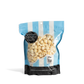 Bag of City Pop Sea Salt Cracked Pepper popcorn with blue and white striped design on a white background