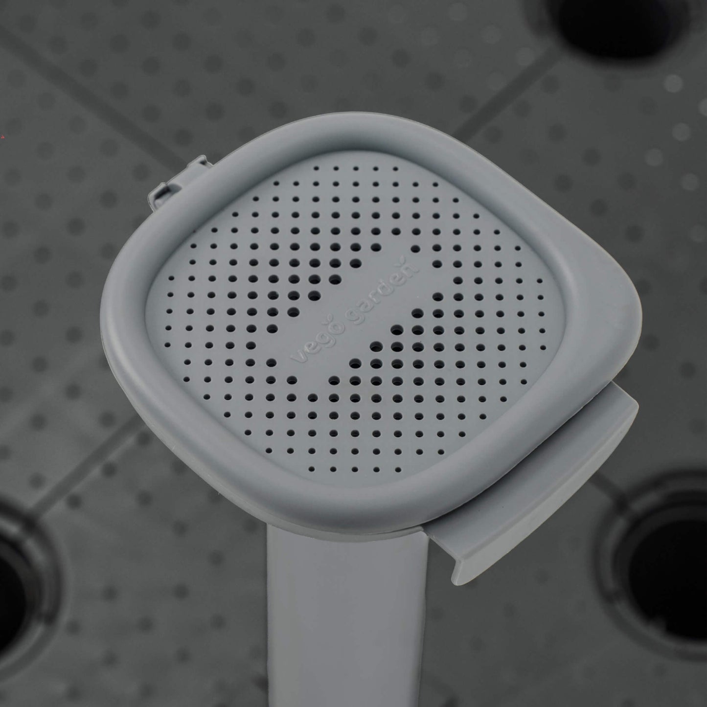 Self-Watering Wicking Floor system watering tube up close. 