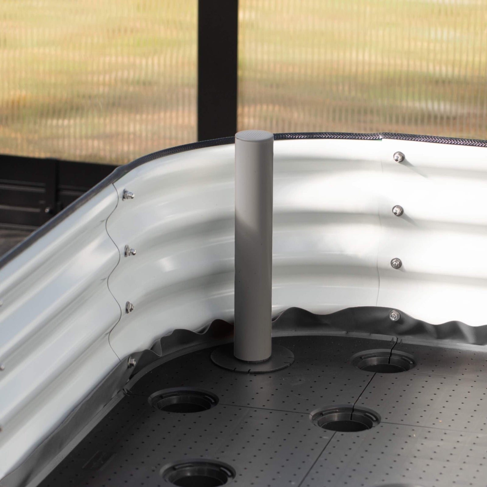 Self-Watering Wicking Floor system airflow tube installed inside a raised garden bed.