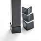 Set of black sleeve feet installed on bed legs on a white background