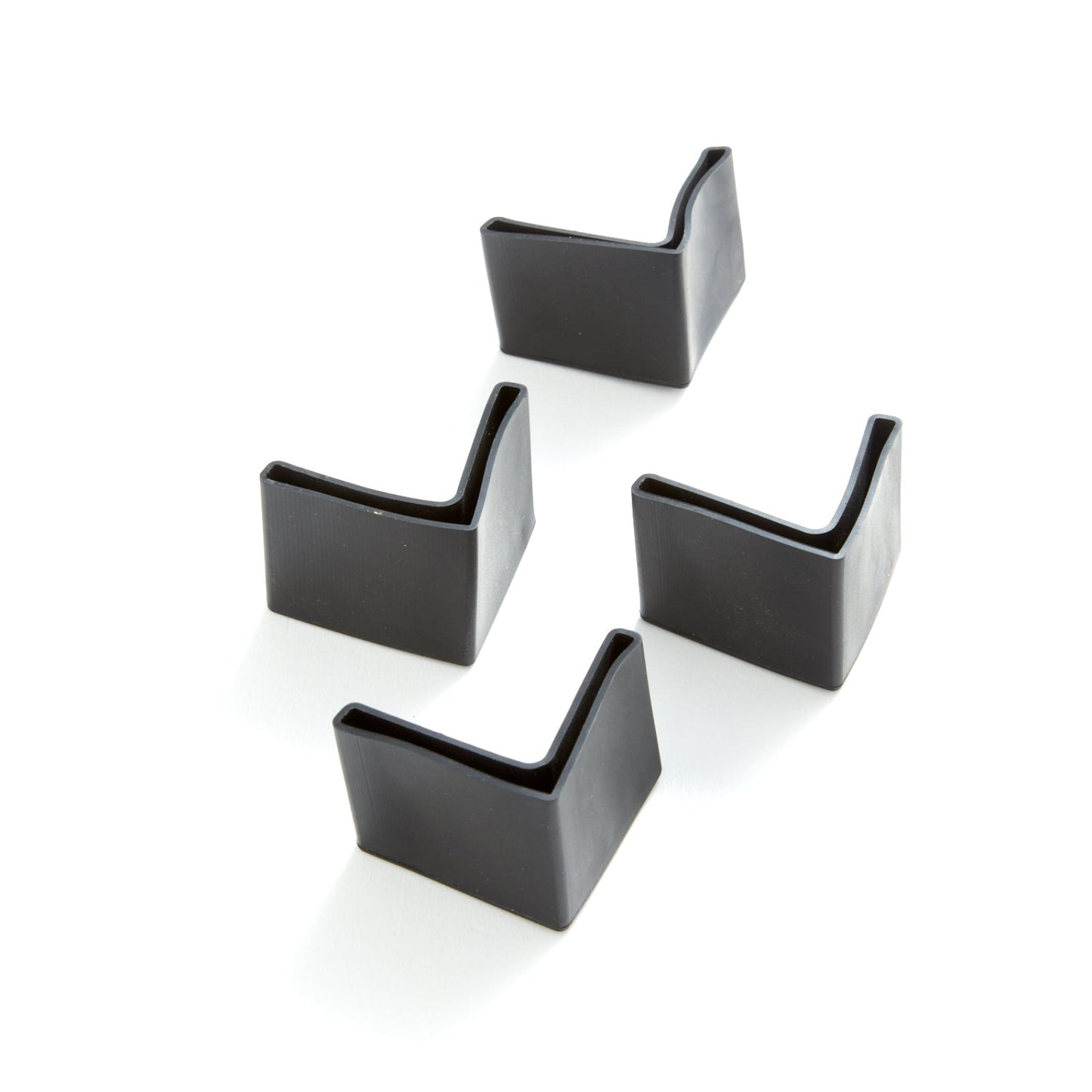 Set of black sleeve feet  on bed legs on a white background