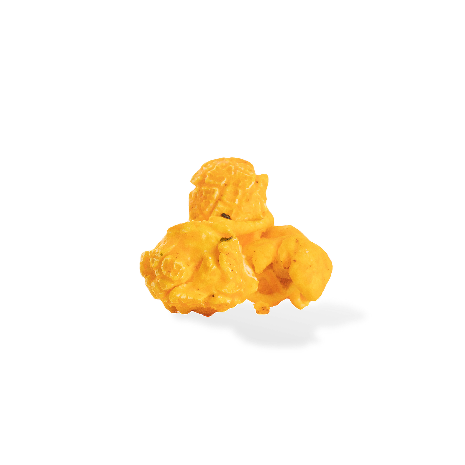 Three pieces of Spicy Buffalo popcorn on a white background