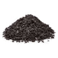 Pile of black Biochar chips on a white background