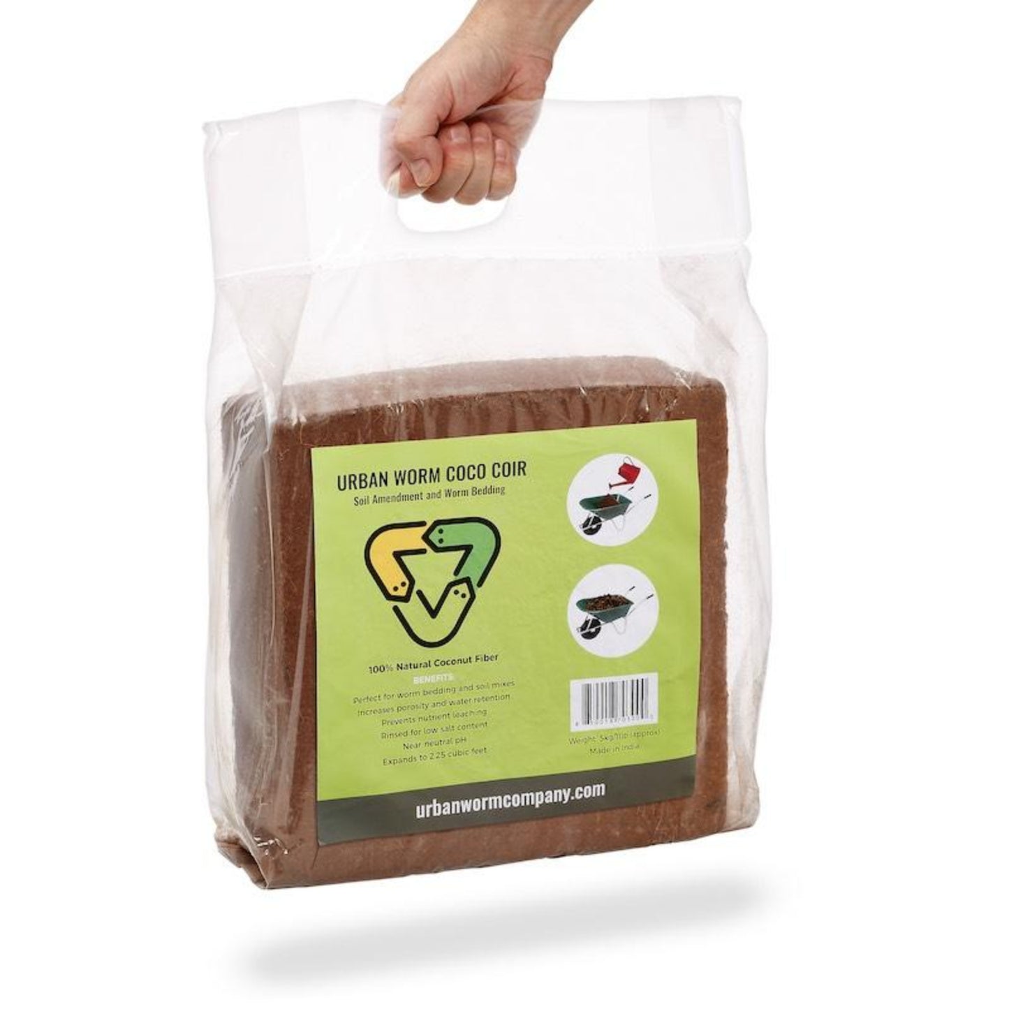 Packaged urban worm coco coir with a hand holding it, on a white background