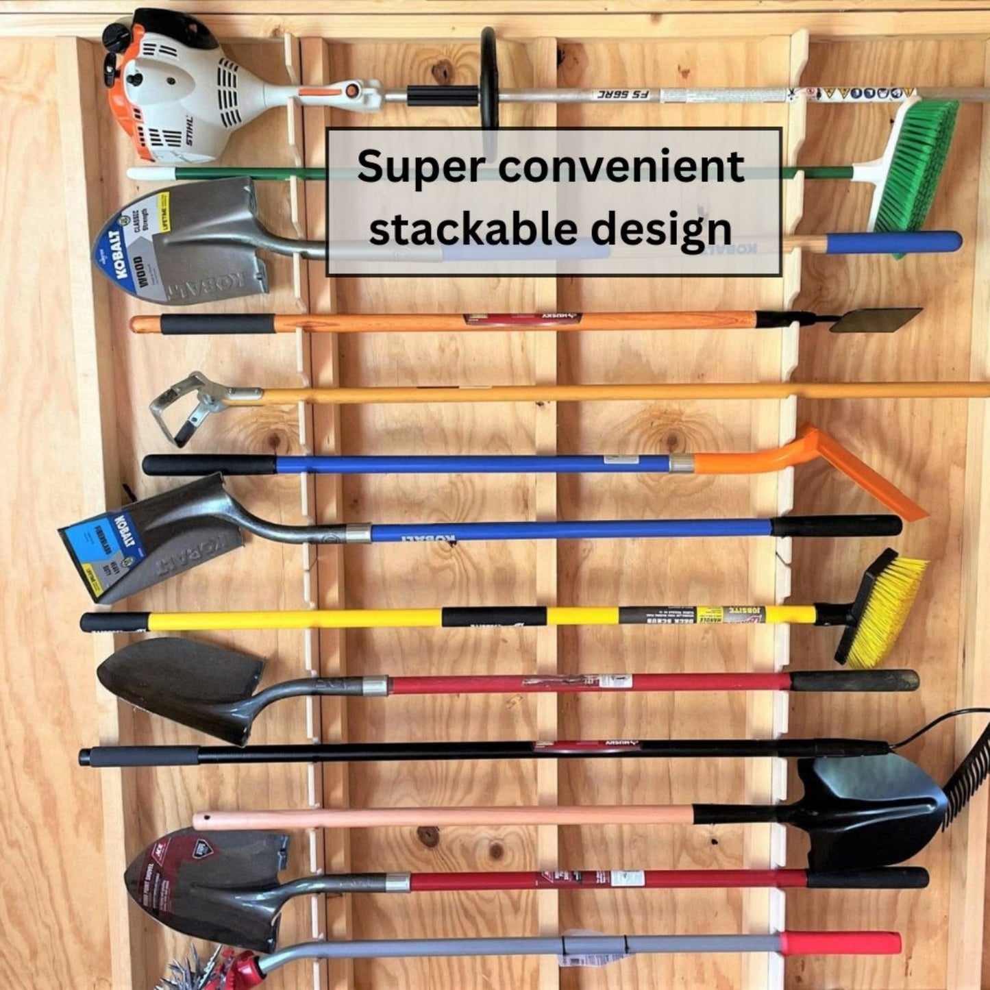 Two vertical garden tool organizers stacked with various gardening tools inside an unfinished shed.
