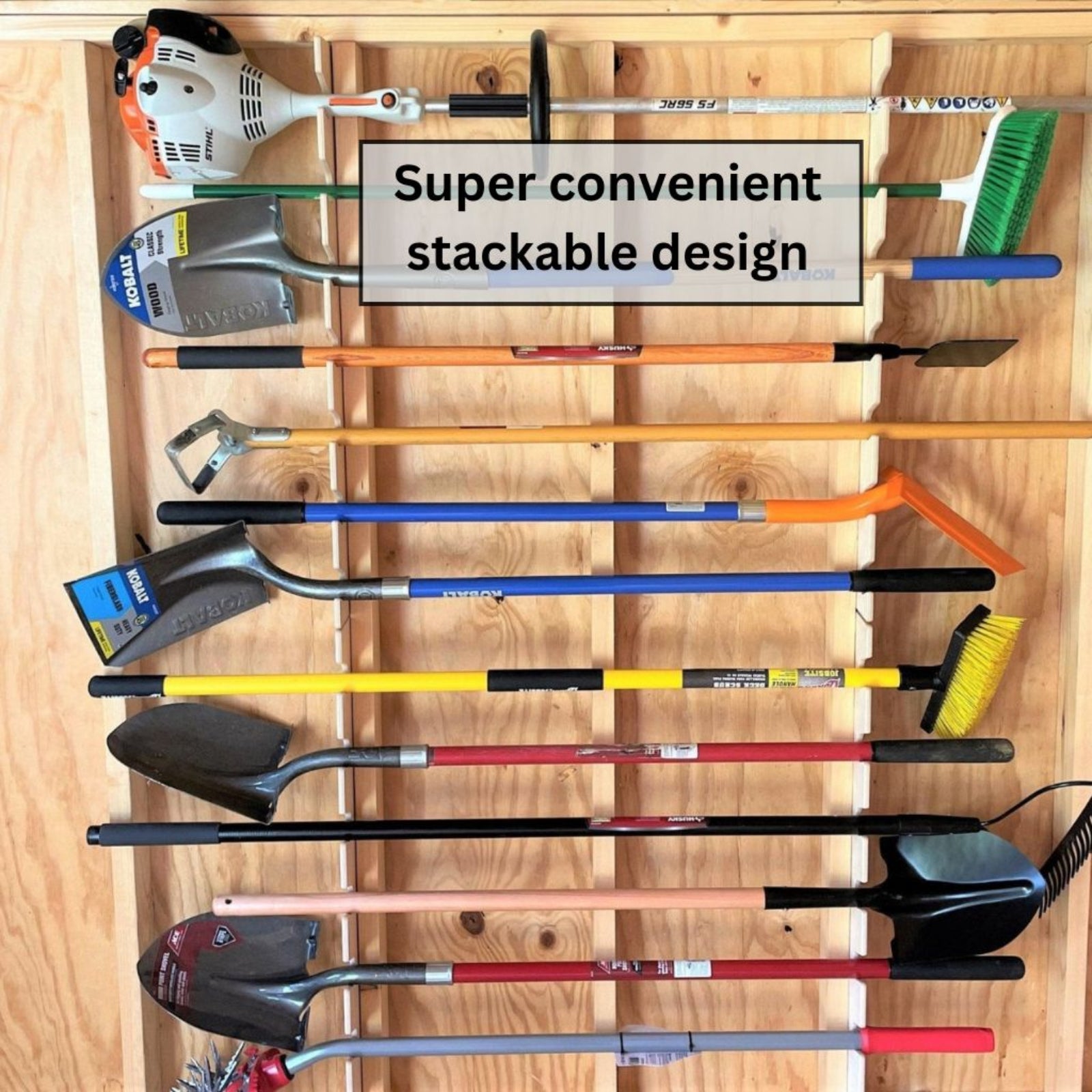 Two vertical garden tool organizers stacked with various gardening tools inside an unfinished shed.