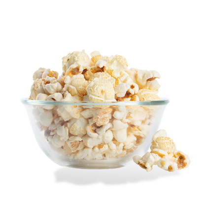 White Cheddar Popcorn popped in a bowl on a white background