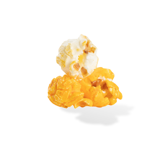 Three pieces of Wing Night popcorn on a white background