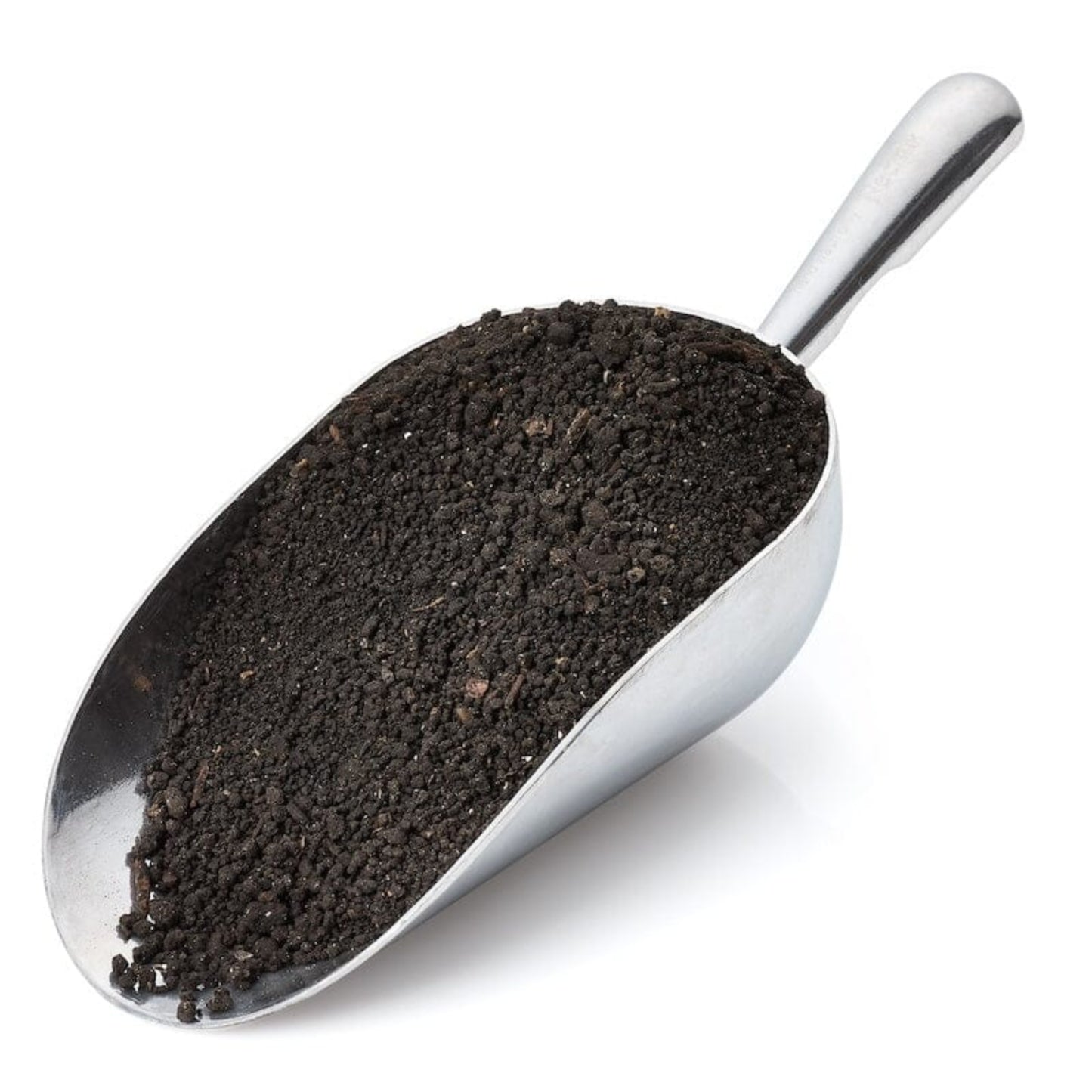 Metal scoop filled with worm castings on a white background