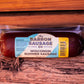 Packaged summer sausage on a wooden surface