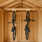 Bike Organizer Stud Mount- two bikes hanging from ceiling joist in shed