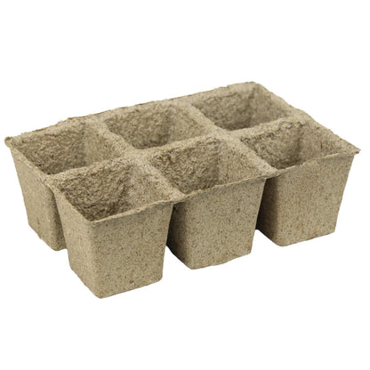 Six-cell biodegradable seed starting pots made from natural fiber, on a white background