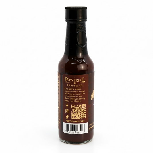 Back label of Chipotle Ghost & Black Garlic Hot Sauce bottle showing ingredients and nutrition facts