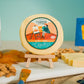 classic gouda cheese packaged surrounded by charcuterie