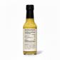 Back label of Creamy Herb & Jalapeño Hot Sauce bottle showing ingredients and nutrition facts