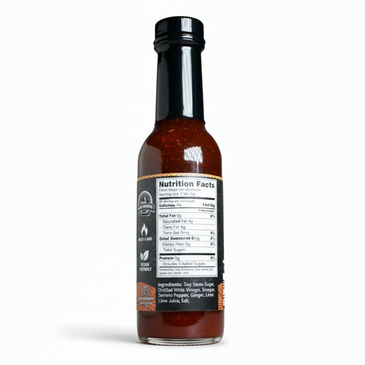 Back label of Dragon's Breath Marinade Hot Sauce bottle showing ingredients and nutrition facts