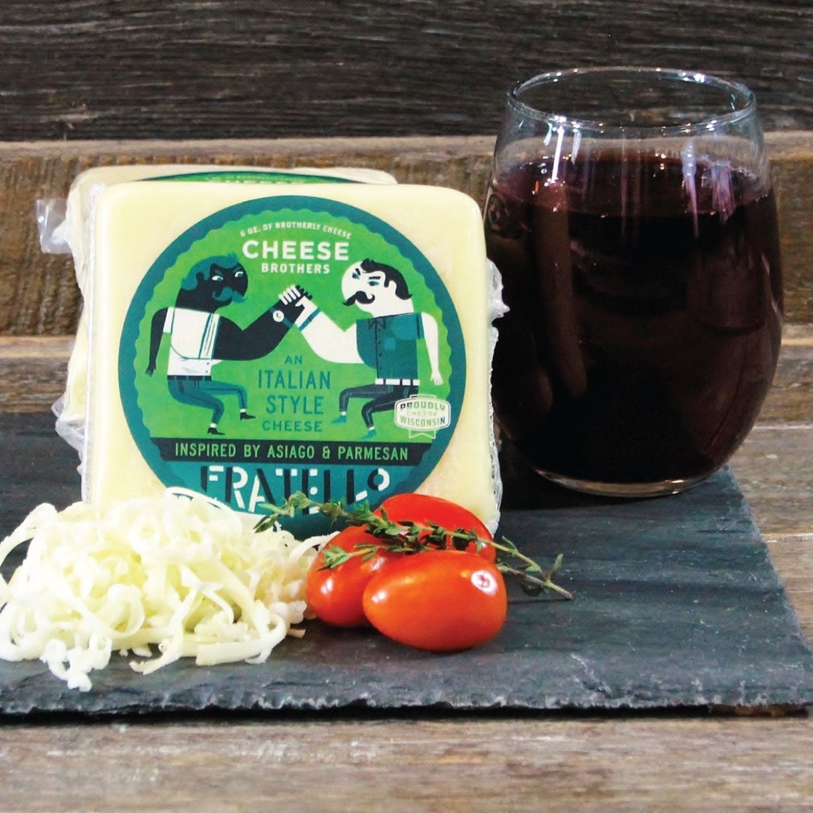 Fratello Cheese Block: Fratello cheese block paired with wine and tomatoes