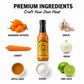 Habanero Hot Sauce bottle surrounded by fresh premium ingredients like habanero peppers, carrot, apple juice, garlic, onion, and spices used to make the sauce.