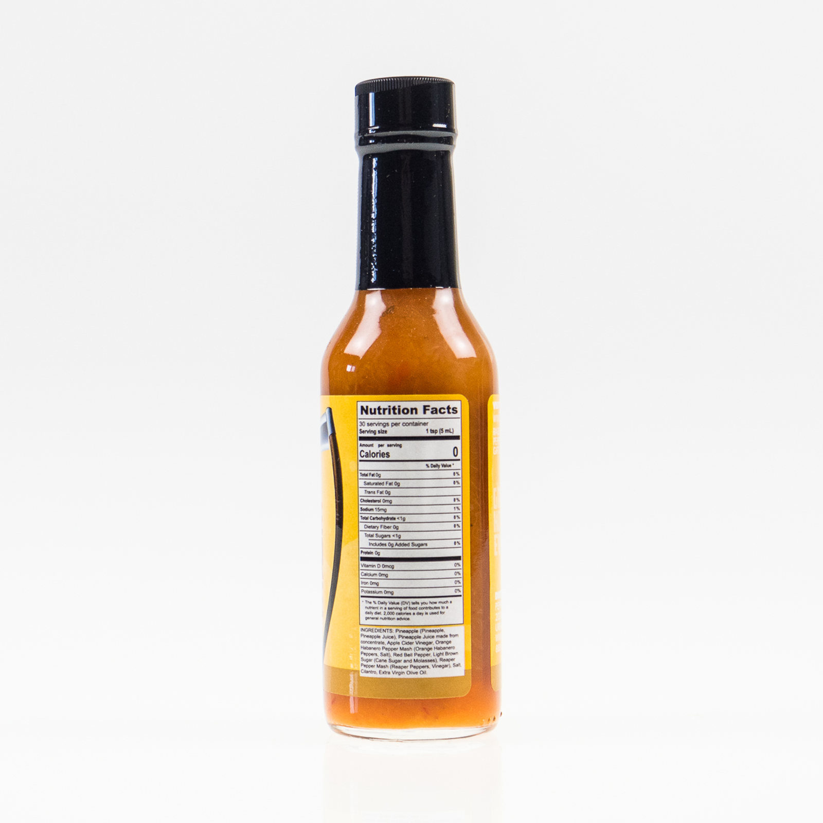 Back label of Pineapple Carolina Reaper Hot Sauce bottle showing ingredients and nutrition facts