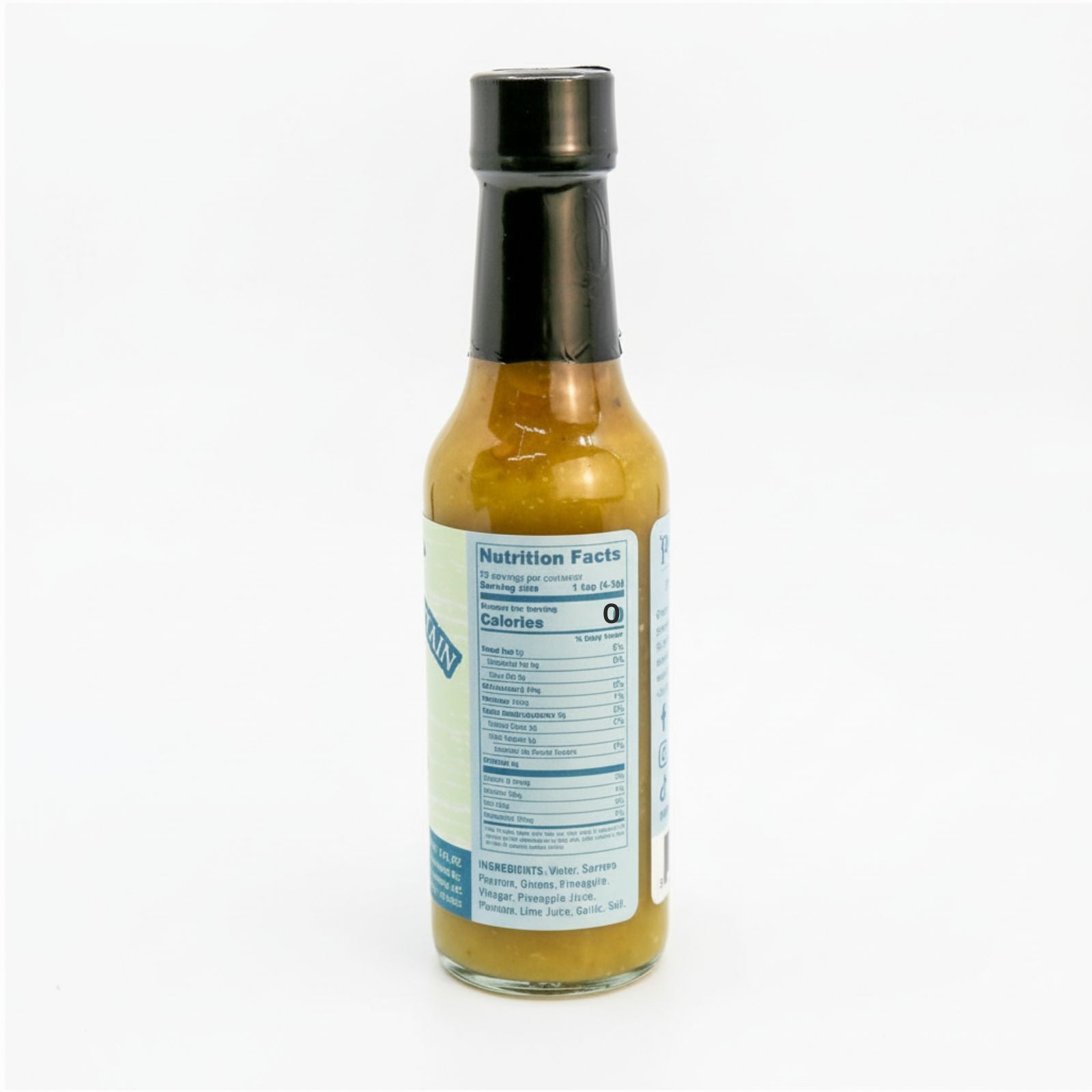Back label of Serrano Pineapple Plantain Hot Sauce bottle showing ingredients and nutrition facts