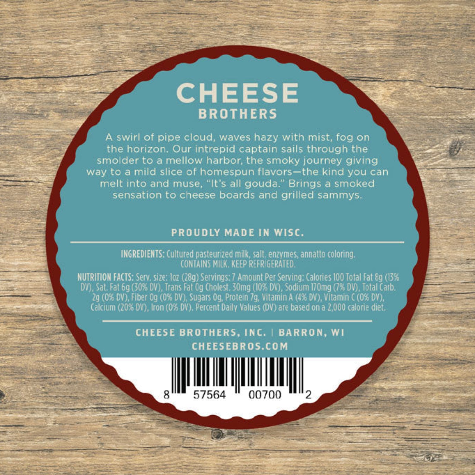 Smoked gouda cheese product label with ingredients and nutrition facts displayed over wood background