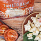 tomato basil cheese curds with sliced tomatoes on wooden table