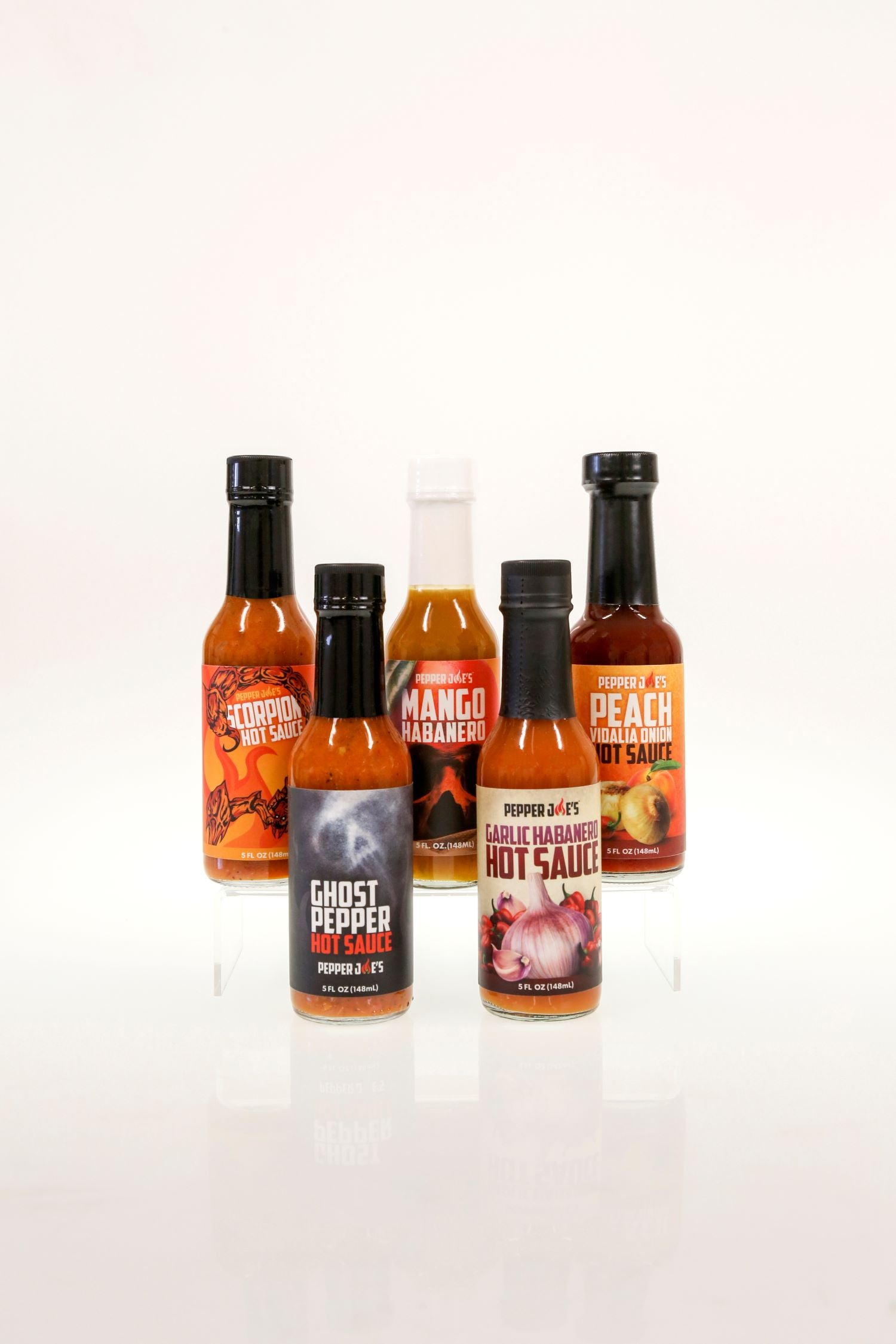 Pepper Joe's 5-Pack Hot Sauce Bundle - five hot sauce bottles lined up on white background