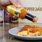 Pepper Joe's Pineapple Hot Sauce - pineapple chilli sauce pour on pizza