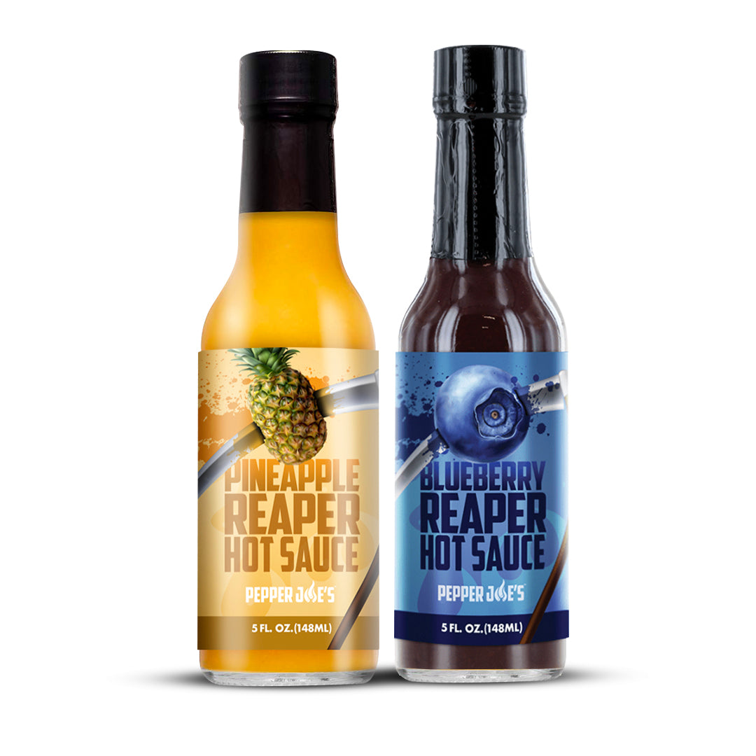 Pepper Joe's Blueberry Reaper Hot Sauce - Pineapple Reaper Hot Sauce - bottles placed on white background