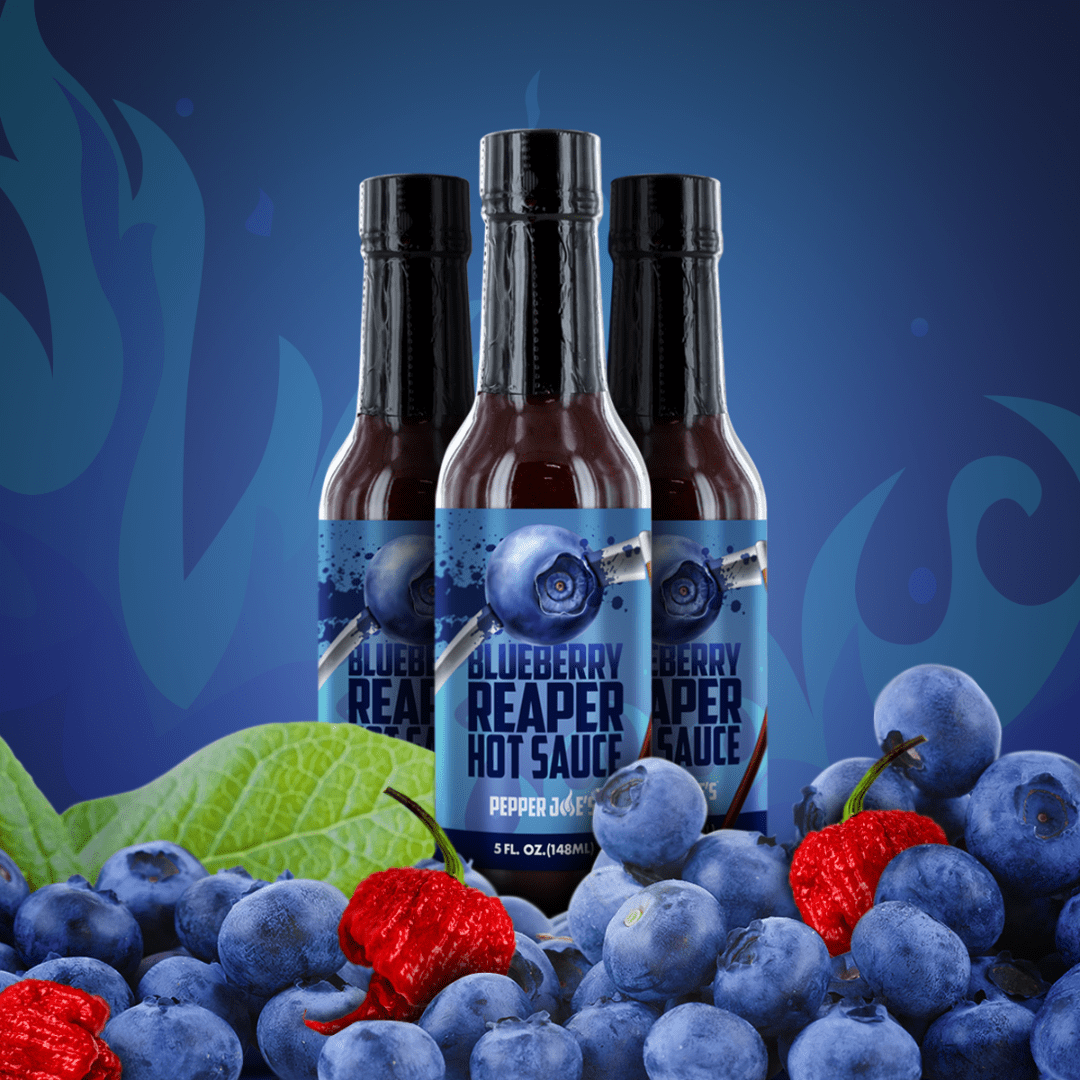 Pepper Joe's Blueberry Reaper Hot Sauce - graphic of three blueberry reaper hot sauces with blueberries covering the bottles