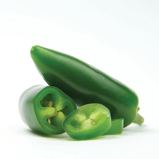 Pepper Joe's Felicity pepper seeds - green pepper sliced to show thick walls and seed on white background