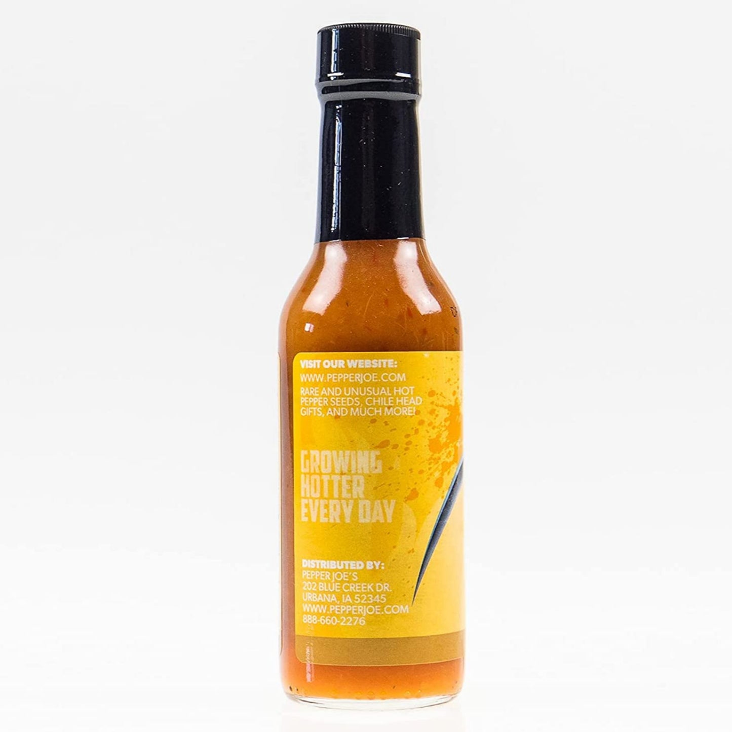 Pepper Joe's Pineapple Reaper hot sauce on white background, close up of label