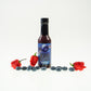 Pepper Joe's Carolina Reaper hot sauce gift set - Blueberry Reaper hot sauce bottle with blueberries around sauce
