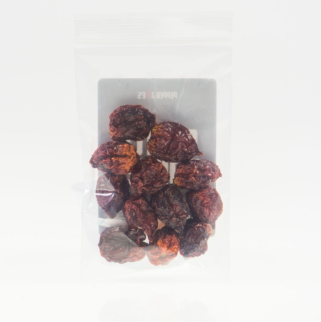 Pepper Joe's Scotch Bonnet Dried Peppers - back of clear bag packaging with dried pods inside