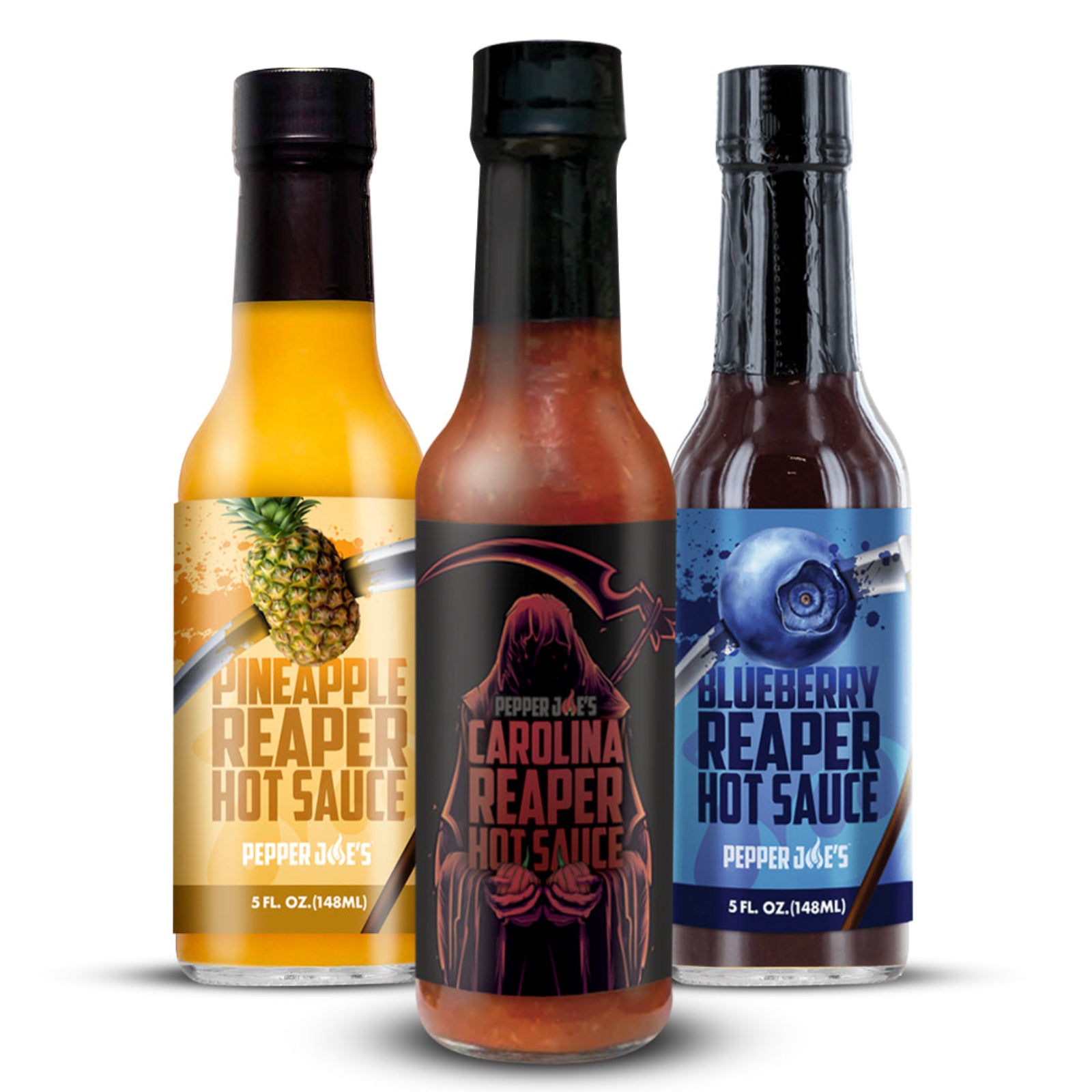 Pepper Joe's Carolina Reaper hot sauce gift box  that includes one bottle each of Blueberry Reaper, Pineapple Reaper, and Carolina Reaper on a white background