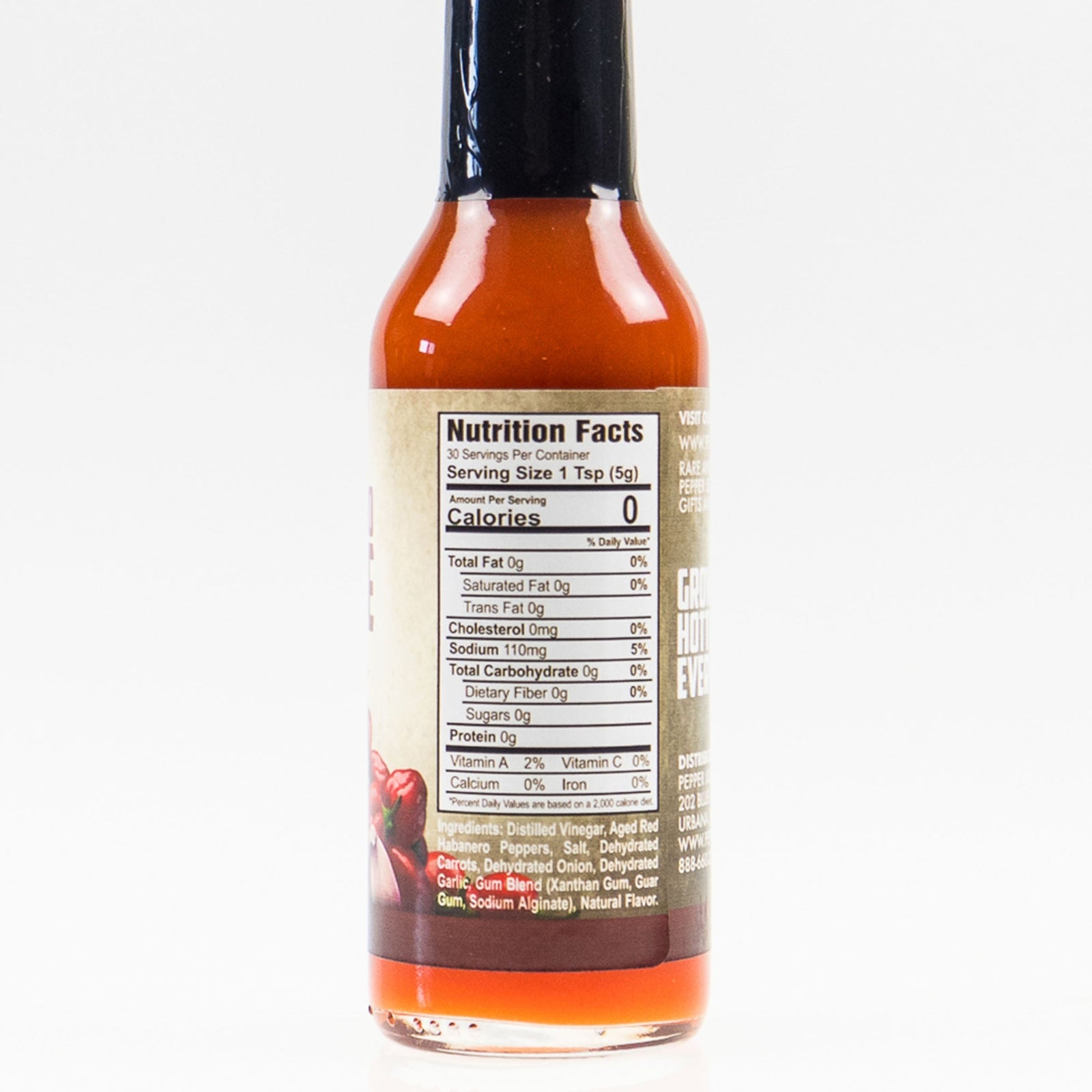 Back label of Pepper Joe's Habanero Garlic Hot Sauce bottle showing ingredients and nutrition facts