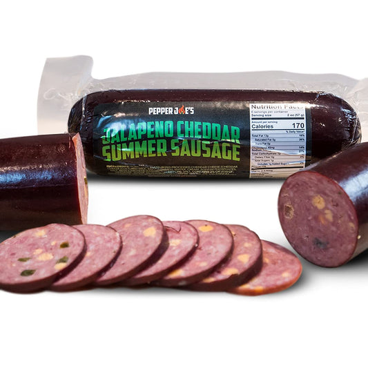 Pepper Joe's spicy jalapeno cheddar summer sausage - cut pieces of spicy sausage up close 