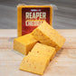 Pepper Joe's Carolina Reaper Cheddar Cheese Block Displayed on cutting board