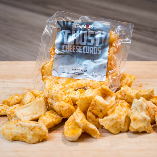pepper joes Ghost Pepper Cheese Curds in package on wood cutting board